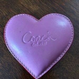 Vintage coach heart paperweight.